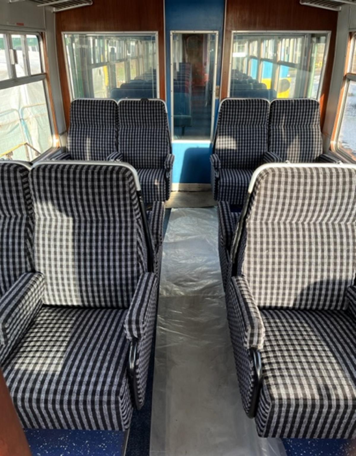 Newly fitted hand rails on first class seating.