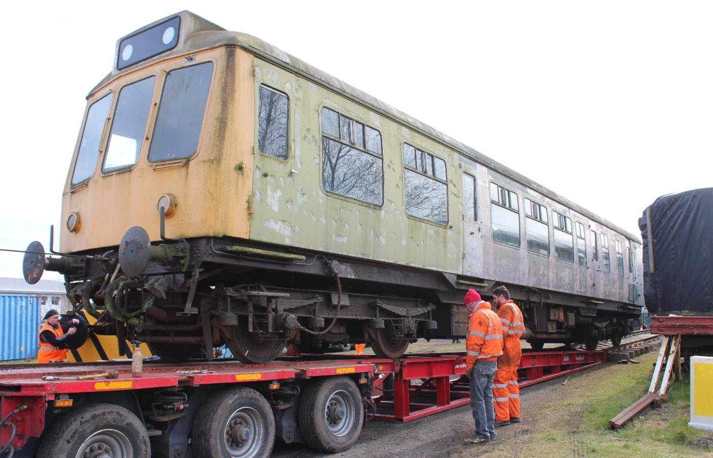 Our DMU being rolled off the low-loader.