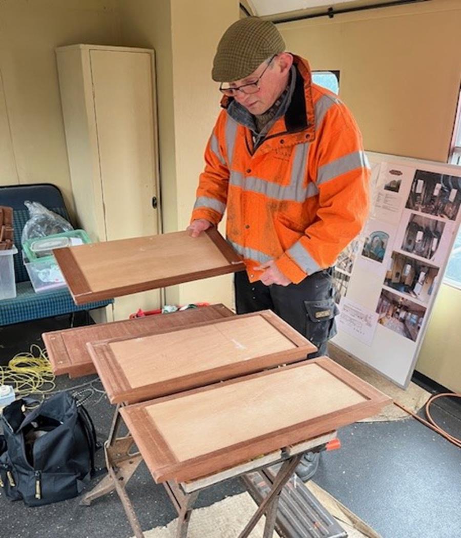 Clive working on batch of top panels.