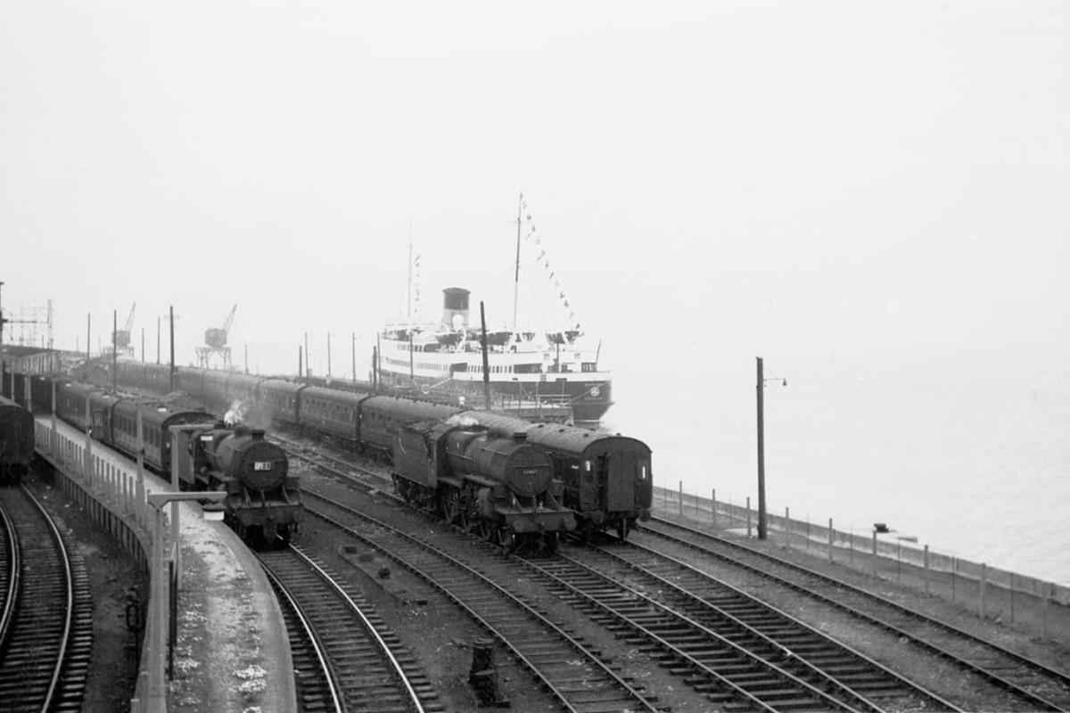 A picture of Fleetwood Station, Isle of Man terminus, showing two Crab 2-6-0 Locomotives with an IOM fery in the background. © Copyright, Dave Schofield